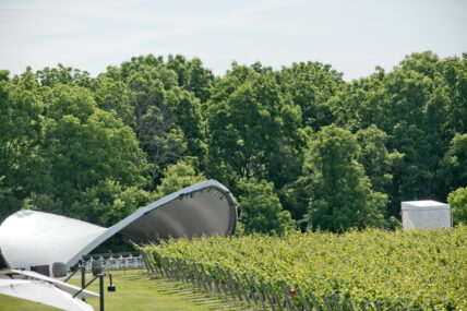 A bandshell set up for an outdoor concert a winery in Niagara on the Lake