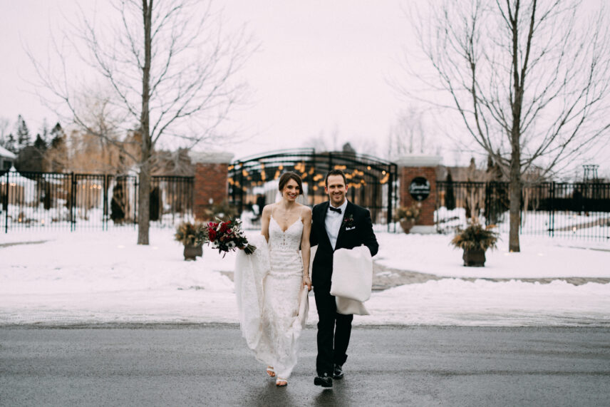 A bride at Pillar and Post carrying her winter bouquet