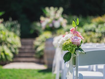 A wedding corsage at an outdoor venue at Inn On The Twenty in Jordan, Ontario.