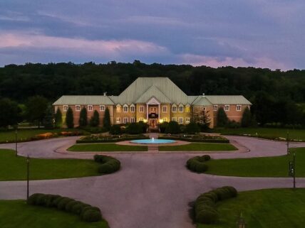an evening view of Château des Charmes from a distance in Niagara-on-the-Lake.