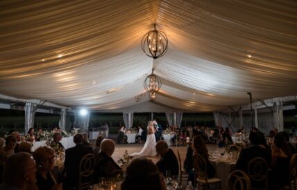 A couple dances under the chandelier at Chateau des Charmes winery