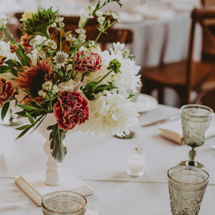 A floral arrangement at a wedding a Cave Spring Vineyard