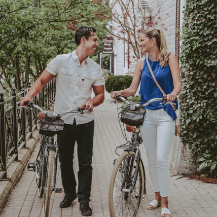 Couple enjoying bicycles during their stay in Jordan House in Twenty Valley