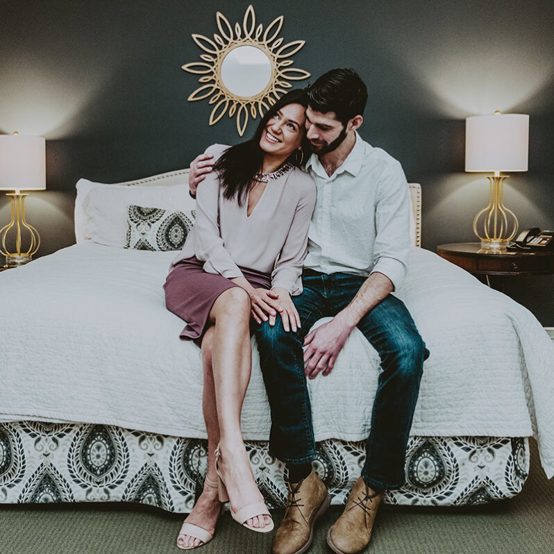 Couple spending the night in a in cozy accommodations at Inn On The Twenty hotel in Jordan Village