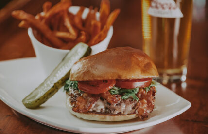 Bacon cheeseburger with fries at Jordan House Tavern at Jordan House in Jordan Village