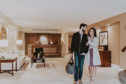 A couple walking into the Inn On The Twenty hotel in Jordan.