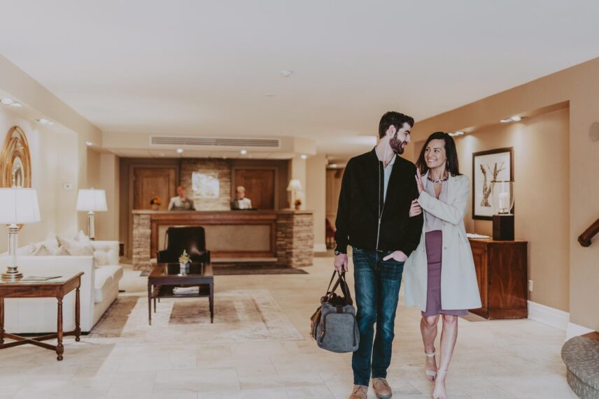 A couple walking into the Inn On The Twenty hotel in Jordan.