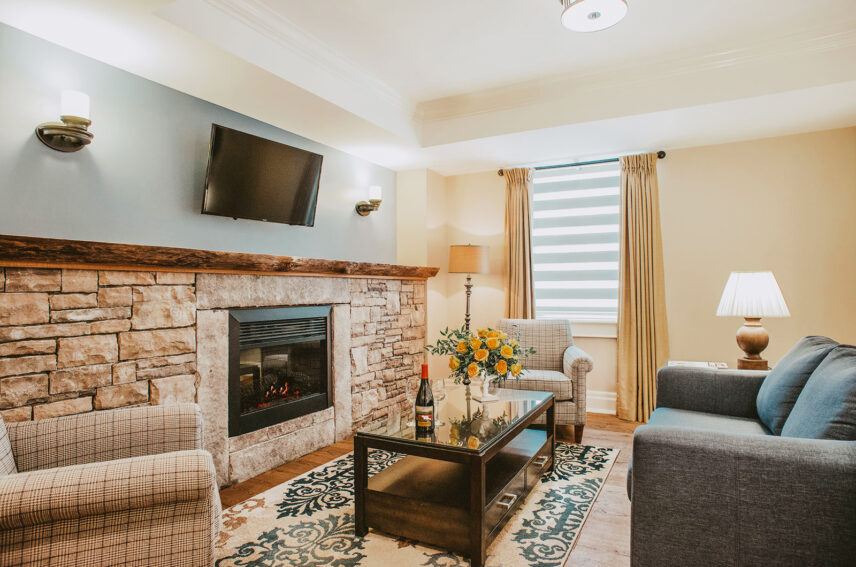 Premium Guest Suite seating area with high ceilings at Inn On The Twenty in Jordan Village
