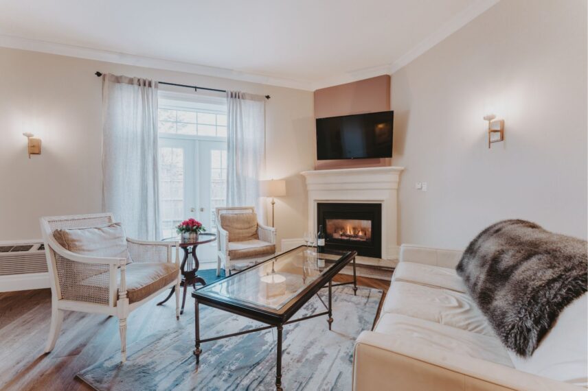 Signature Guest Suite seating area with fireplace at Inn On The Twenty in Jordan Village
