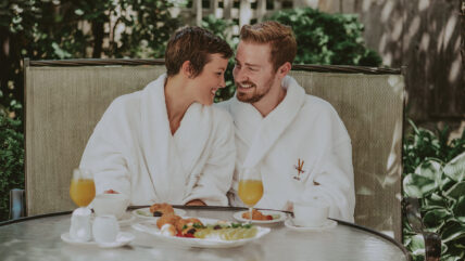 A couple enjoying a meal at Spa On The Twenty in Jordan Village