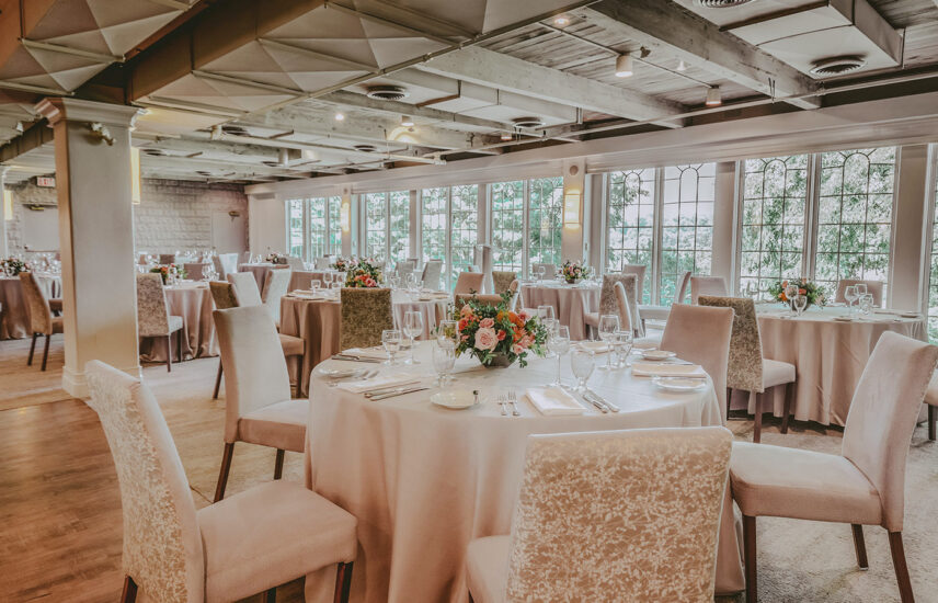 Floor-to-ceiling, wall-to-wall windows at Windows On The Twenty wedding venue at Inn On The Twenty in Jordan Village