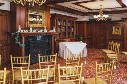 A fall wedding inside the Three Feathers event space at Prince of Wales in Niagara-on-the-Lake.