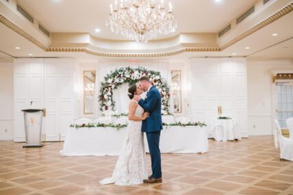 A couple in the Georgian Ballroom at Queen’s Landing.