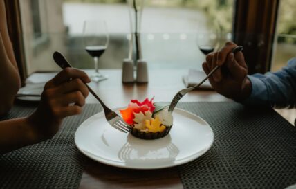A couple enjoying maple themed treats at Headwaters Restaurant.