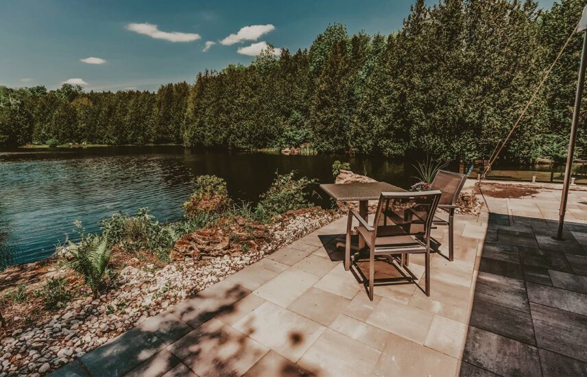 Patio dining table overlooking the mill pond at Millcroft Inn & Spa