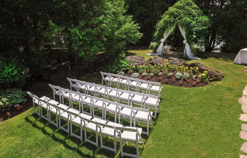 Areil view of wedding ceremony layout of Millcroft’s Riverside Wedding Garden wedding venue at Millcroft Inn & Spa in Caledon