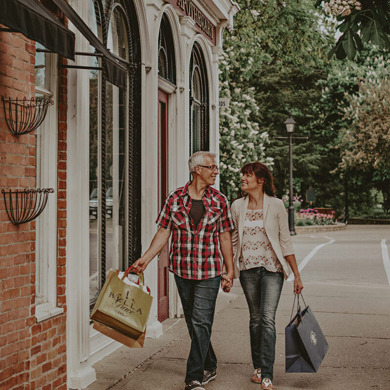 Couple shopping in Old Town near Moffat Inn in Niagara on the Lake