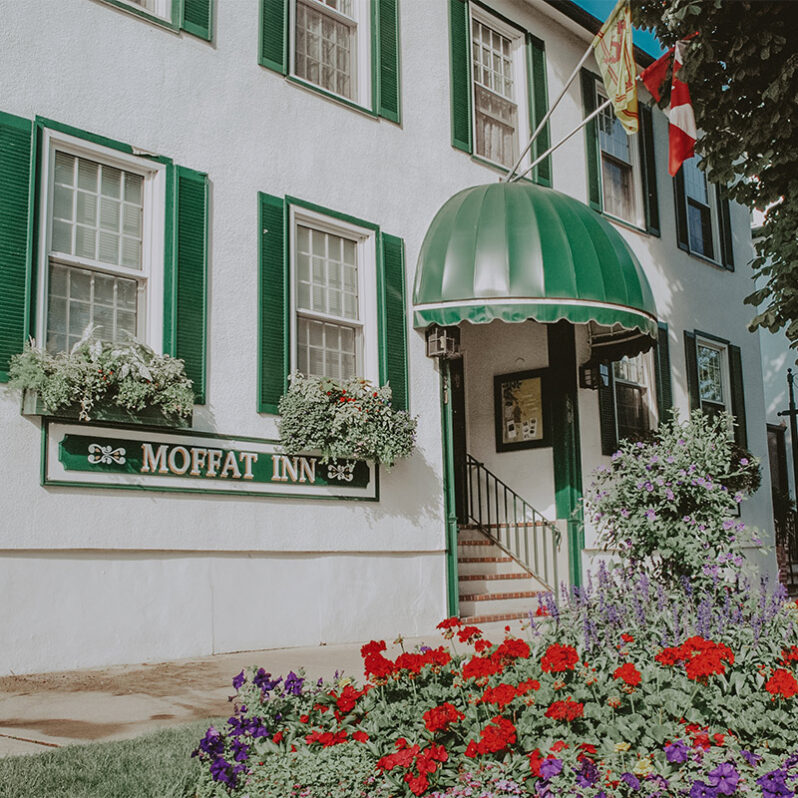 Flower bushes near the entrance to Moffat Inn in Niagara on the Lake