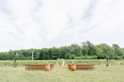 Outdoor wedding venue by a field in Niagara-on-the-Lake at the Hare Wine Co.