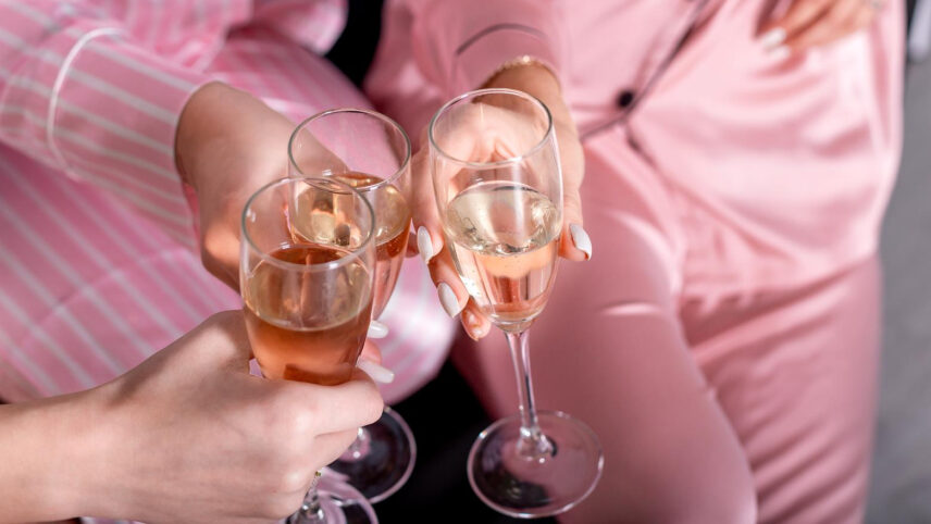 A group of girls toasting with champagne during their stay at Vintage Hotels in Niagara-on-the-Lake.
