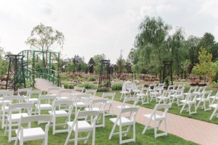 A wedding ceremony at Pont du Monet in The Gardens at Pillar and Post.