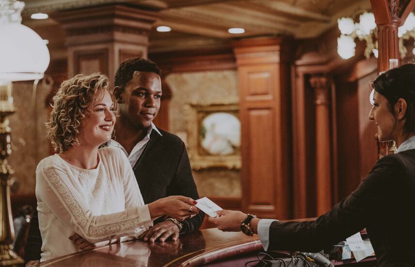 Couple checking into Prince of Wales Hotel in Niagara-on-the-Lake