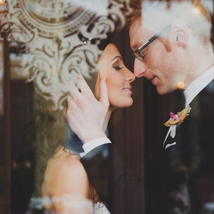 A couple embracing at their wedding in the Prince of Wales hotel in Niagara-on-the-Lake.