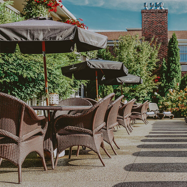 Enjoy poolside casual dining at Pillar and Post in Niagara-on-the-Lake.