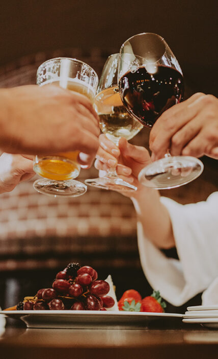 Group toast at Vintage Wine Bar & Lounge at the Pillar & Post Hotel in Niagara-on-the-Lake