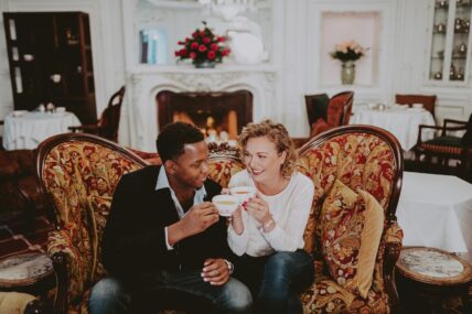 A couple enjoying tea in The Drawing Room in Niagara-on-the-Lake.