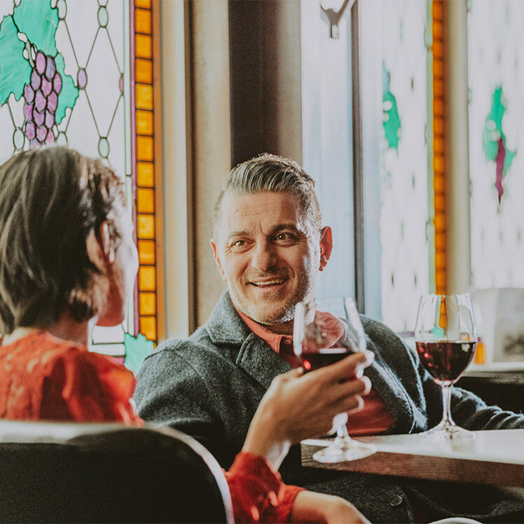 Couple experience casual dining at Bacchus Lounge in Queen's Landing