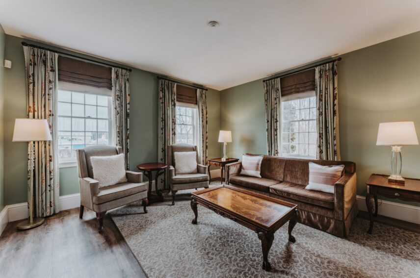 Seating area of the Lower Cottage Guest room at Queen's Landing in Niagara-on-the-Lake.
