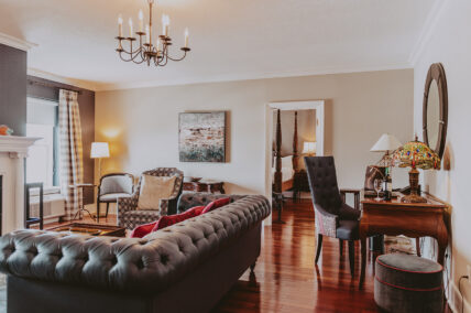 Stately furniture in additional living area in the Victoria & Royal Suite at the Queens Landing Hotel in Niagara-on-the-Lake