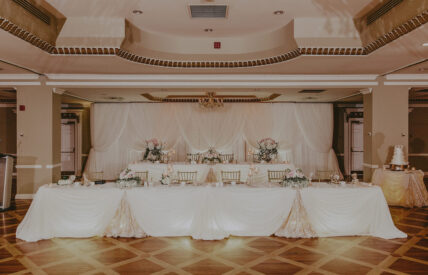 Wedding party seating in the Georgian Ballroom wedding venue at the Queens Landing Hotel in Niagara-on-the-Lake