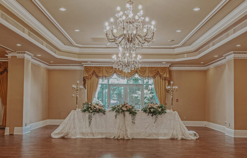 Wedding party seating in the Imperial Ballroom wedding venue at the Queens Landing Hotel in Niagara-on-the-Lake