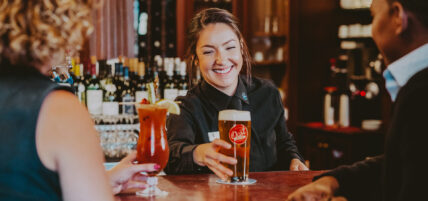 Bartender serving drinks at Churchill Lounge at Prince of Wales in Niagara-on-the-Lake