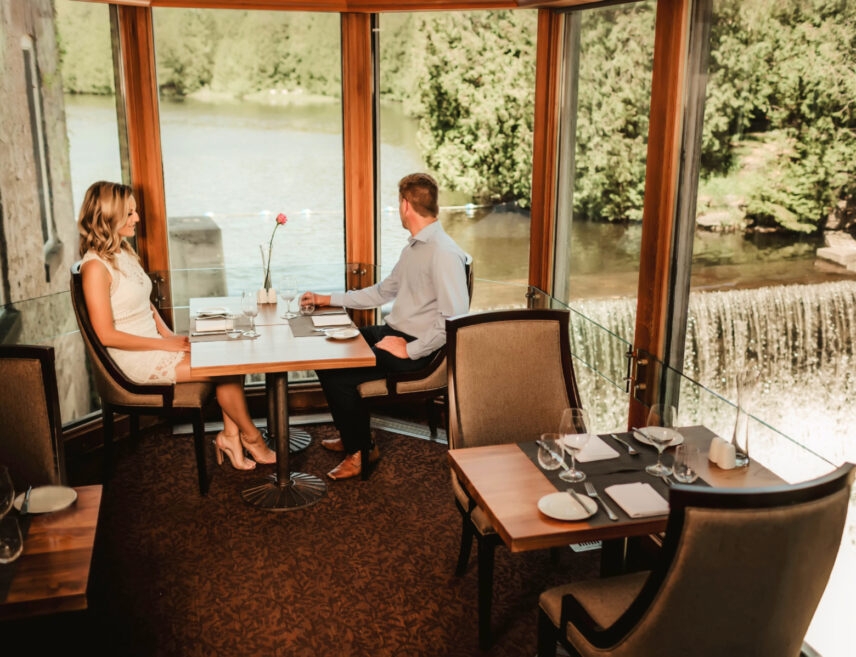 A couple enjoying a fall meal at Headwaters Restaurant in Caledon