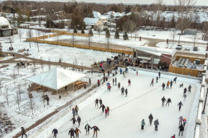 People skating at the ice rink in the Gardens at Pillar and Post