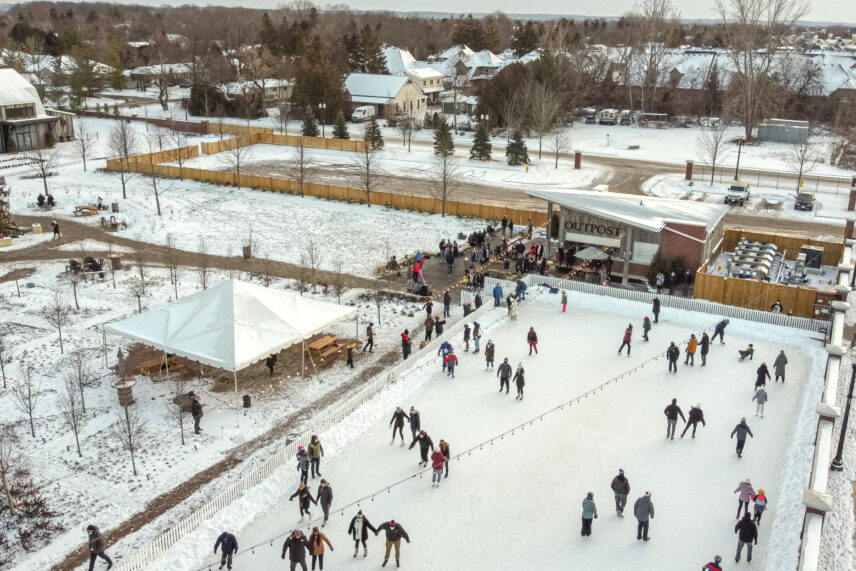 People skating at the ice rink in the Gardens at Pillar and Post