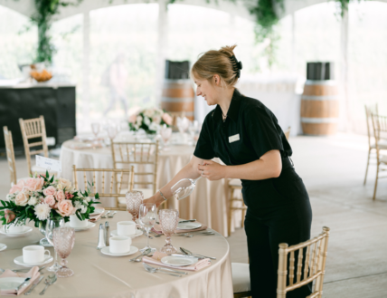 A Vintage Hotels team member preparing for a pop-up wedding.